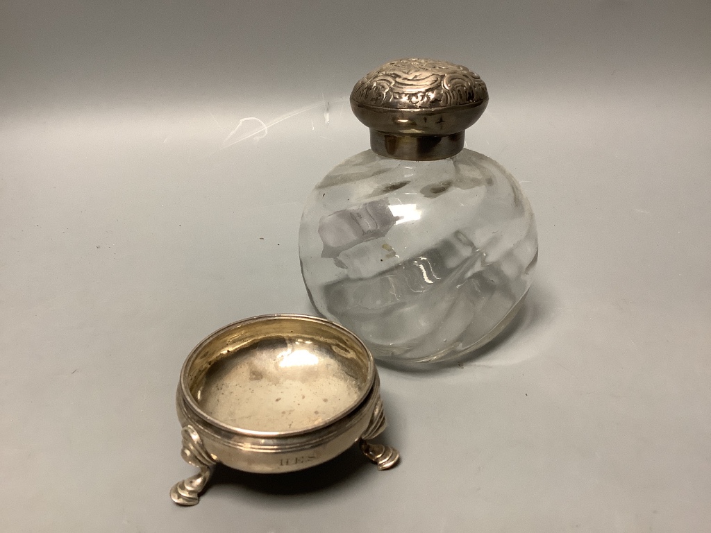 Three assorted silver mustard pots, a silver mounted glass scent bottle and Georgian silver salt.